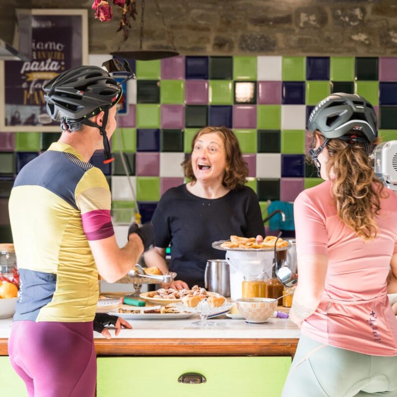 Cyclist drinking coffee t the bar