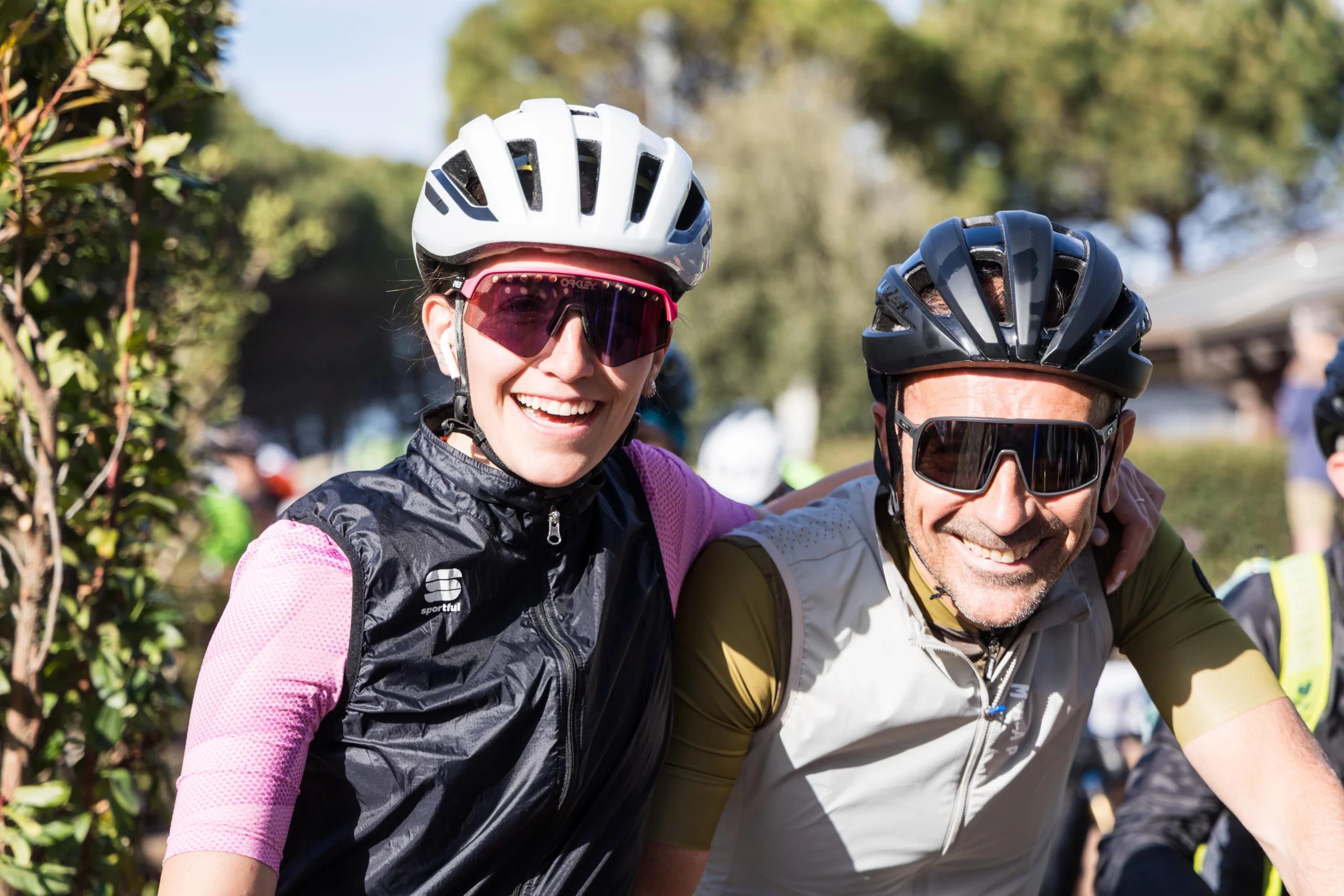 couple smiling at the camera at a gravel event